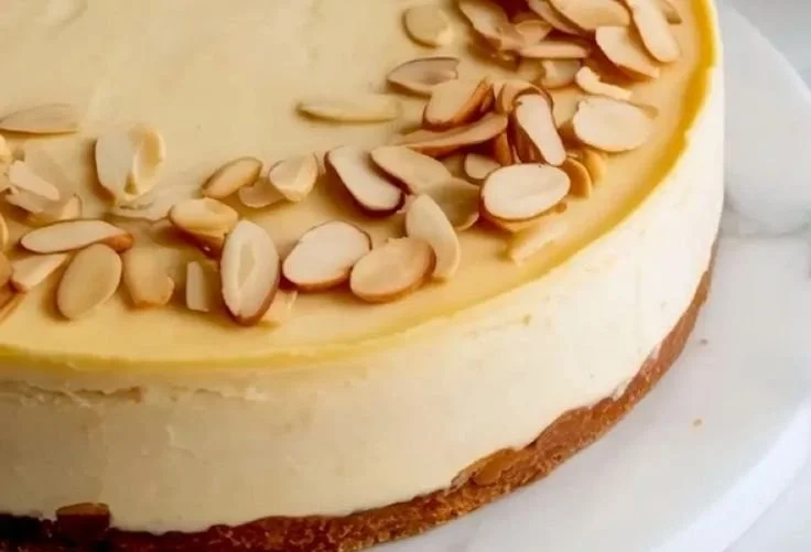 Delicious Amaretto Cheesecake with creamy filling and a crumbly crust