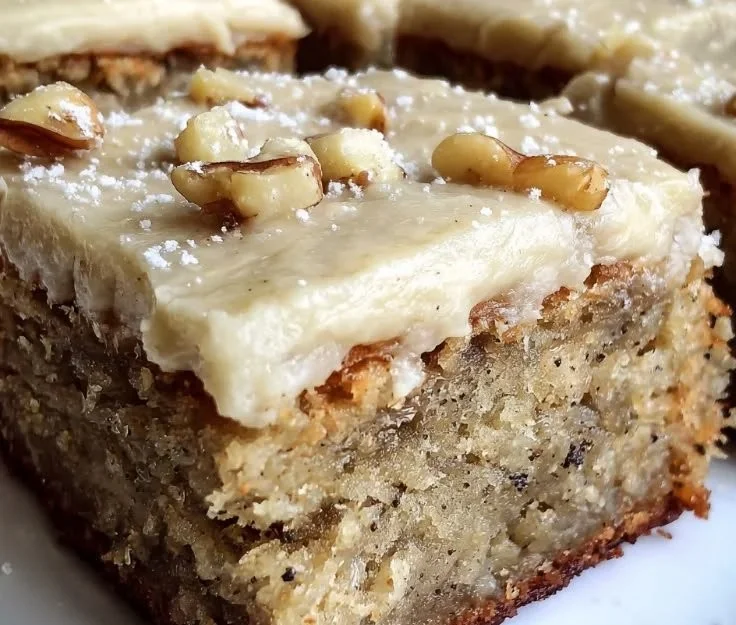 Delicious banana bread brownies topped with rich brown butter frosting
