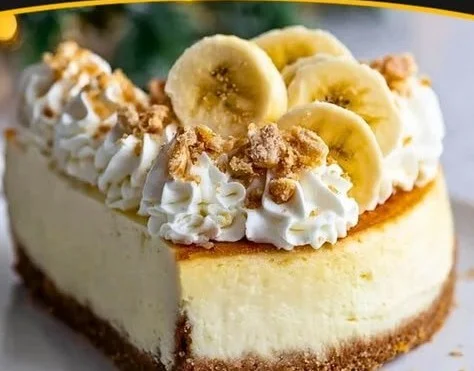 Delicious homemade banana cream cheesecake with whipped cream topping