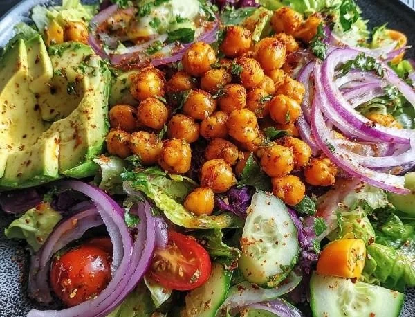Delicious Divorce Salad with spicy chickpeas and avocado dressing on a plate