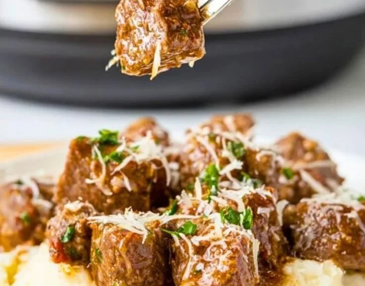 Crockpot garlic parmesan steak bites served on a platter