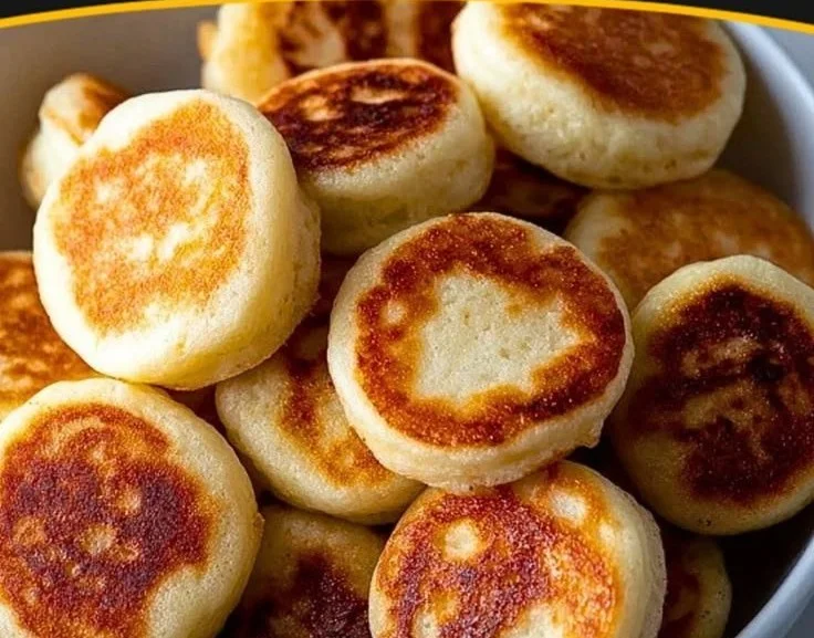 Delicious easy breakfast pancake poppers served on a plate.