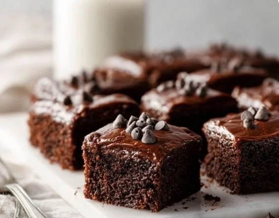 Delicious easy chocolate cake topped with chocolate frosting