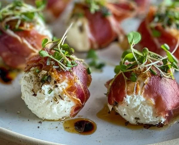 Delicious Goat Cheese Bonbons wrapped in prosciutto for gourmet appetizers.