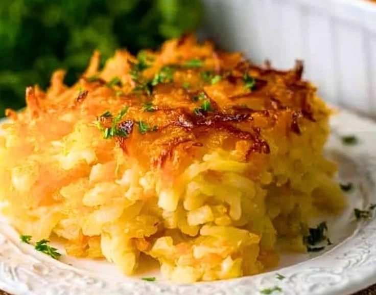 Delicious Hashbrown Casserole baked to perfection with cheese and crispy edges.