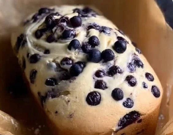 Heavenly blueberry cream cheese loaf baked to perfection with fresh blueberries.