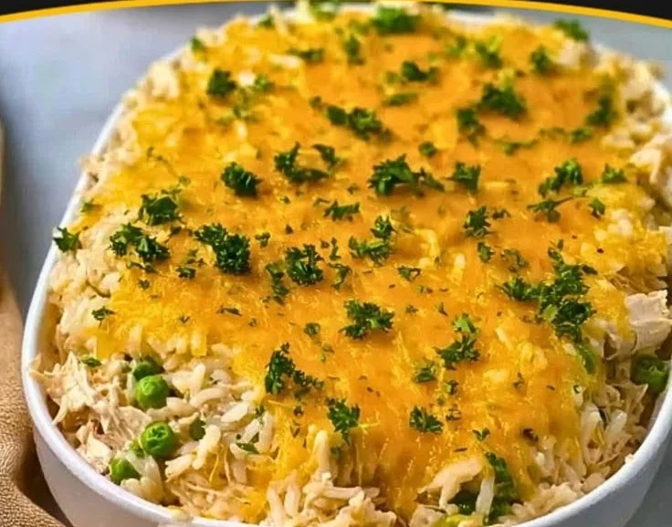 Delicious rotisserie chicken and rice casserole baked to golden perfection
