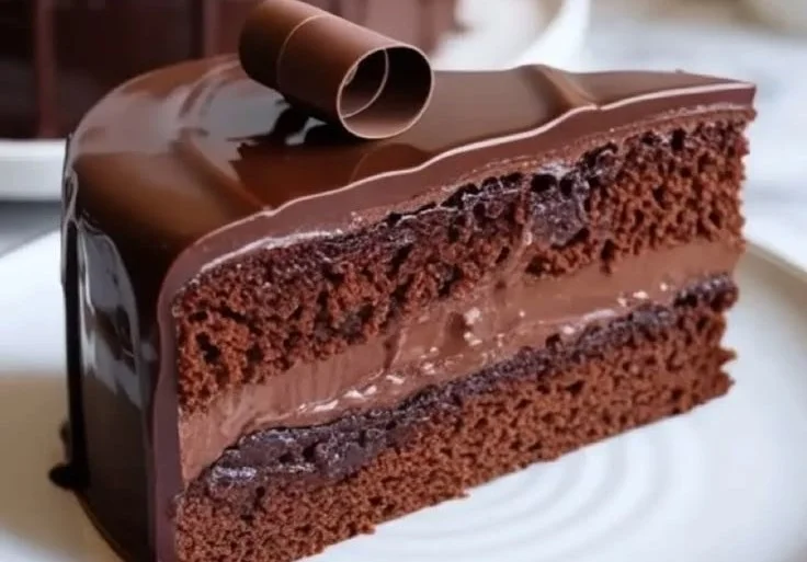 Sour Cream Chocolate Cake with rich chocolate frosting and decorations