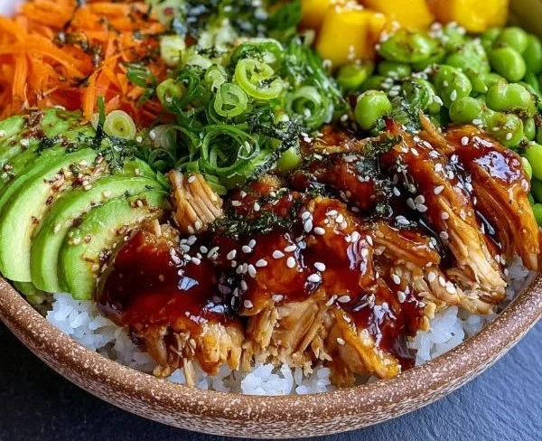 Delicious Sticky Chicken Poke Bowls with fresh vegetables and rice