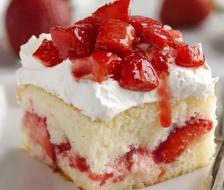 Delicious strawberry shortcake sheet cake with fresh strawberries and whipped cream
