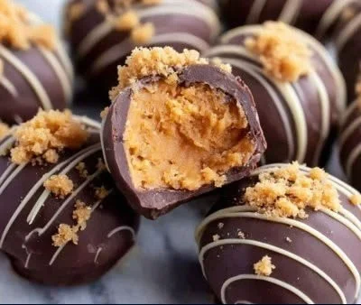 Delicious Butterfinger Balls made with chocolate and crisp peanut butter crunch.