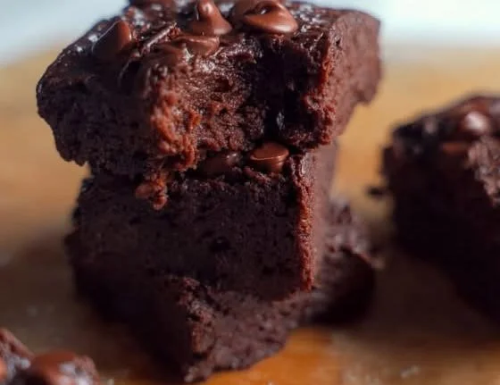 Delicious Cottage Cheese Protein Brownies on a plate, rich and healthy dessert.