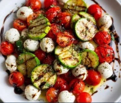 Delicious Cucumber Caprese Salad with fresh mozzarella, tomatoes, and basil