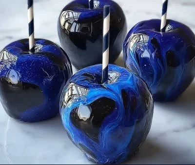 Halloween Black Swirl Candy Apples decorated for the spooky season