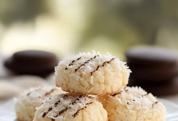 Delicious no-bake coconut cookies on a plate, ready to enjoy.