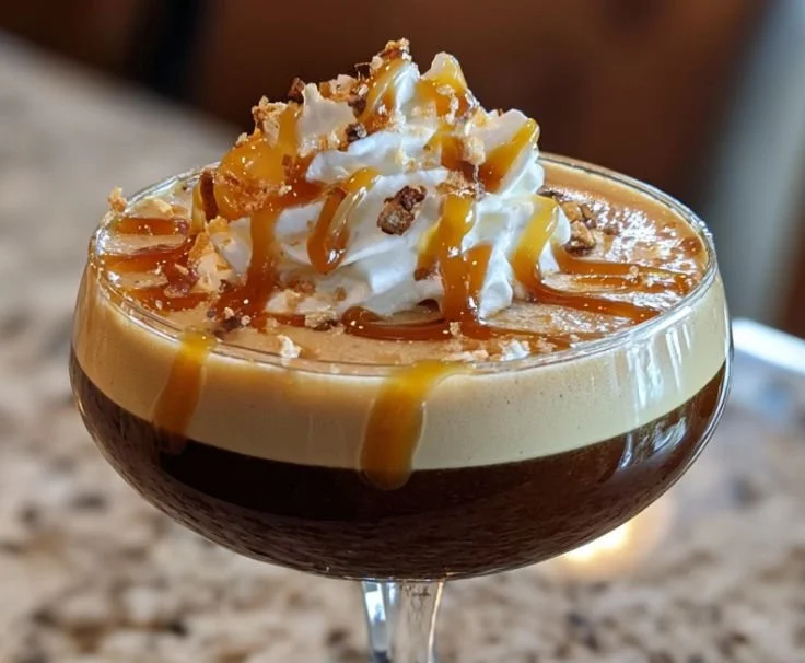 Salted Caramel Espresso Martini cocktail garnished with caramel drizzle.