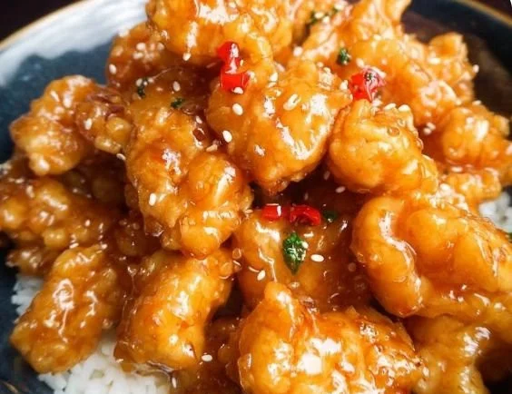 Simple orange chicken recipe with crispy chicken and tangy orange sauce