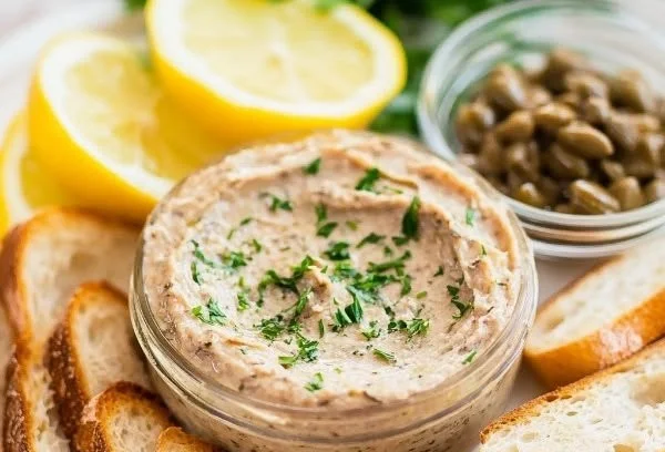 Delicious bowl of Ultimate Sardine Pâté served with fresh bread.