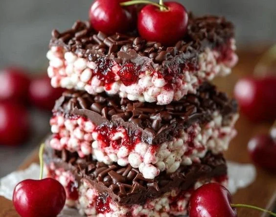 Delicious Cherry Rice Krispie Treats with a fruity twist on a classic dessert.