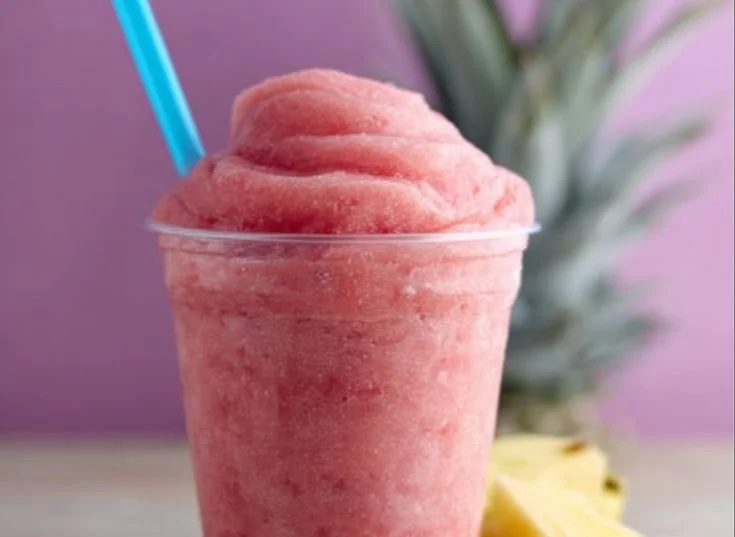 Delicious strawberry dole whip served in a bowl, perfect summer treat.
