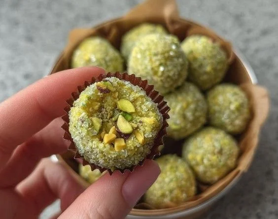 Delicious homemade Pistachio Brigadeiros on a decorative plate